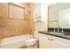 Bathroom boasts a shower-tub combination and vanity with granite countertop and white storage at 3428 Longleaf Rd, Ormond Beach, FL 32174