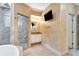 Elegant bathroom with a walk-in shower, modern fixtures, and neutral tile at 3428 Longleaf Rd, Ormond Beach, FL 32174