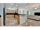 Spacious kitchen with wood cabinets, stainless appliances, and an open layout at 3428 Longleaf Rd, Ormond Beach, FL 32174