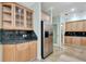 Kitchen featuring stainless steel appliances, wood cabinets, and granite countertops at 3428 Longleaf Rd, Ormond Beach, FL 32174