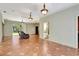 Large living room with tile flooring and access to the backyard, offering a bright, open space at 3428 Longleaf Rd, Ormond Beach, FL 32174