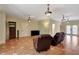 Comfortable living room features a large TV and provides a relaxation area for residents and guests at 3428 Longleaf Rd, Ormond Beach, FL 32174