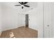 Bedroom featuring wood flooring, closet and ceiling fan at 3655 Scott St, Port Orange, FL 32129