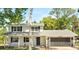 Charming two-story home with a well-manicured lawn and a classic brick facade at 3655 Scott St, Port Orange, FL 32129
