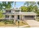 Charming two-story home with a well-manicured lawn and a classic brick facade at 3655 Scott St, Port Orange, FL 32129