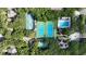 Aerial view featuring community tennis courts and pool at 4403 Sea Mist Dr # 2110, New Smyrna Beach, FL 32169