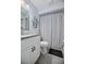 Clean bathroom with a shower-tub combination and a white vanity with granite countertops at 4403 Sea Mist Dr # 2110, New Smyrna Beach, FL 32169