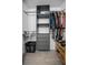 Well-organized closet with shelving, drawers, and hanging space for clothes and accessories at 4403 Sea Mist Dr # 2110, New Smyrna Beach, FL 32169