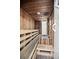 Relaxing sauna with wooden benches, creating a serene space for unwinding after a workout at 4403 Sea Mist Dr # 2110, New Smyrna Beach, FL 32169