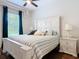 Bedroom featuring a white bed frame, and neutral color accents and ceiling fan at 456 Sea Duck Dr, Daytona Beach, FL 32119