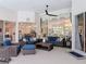 Spacious screened lanai with stylish seating area and views of the lush surroundings at 456 Sea Duck Dr, Daytona Beach, FL 32119