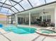 A covered pool and spa are perfect for entertaining, and outdoor living at 456 Sea Duck Dr, Daytona Beach, FL 32119