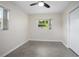 Bedroom featuring a ceiling fan, carpet flooring, and a window at 502 W Hogle Ave, Deland, FL 32720