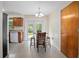 Bright dining area with access to the backyard through French doors at 502 W Hogle Ave, Deland, FL 32720