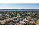 Charming neighborhood aerial view showcasing vibrant homes and a beautiful body of water in the distance at 505 Wisteria Rd, Daytona Beach, FL 32118