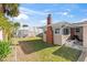 The backyard features a shed and walkway steps to the house at 505 Wisteria Rd, Daytona Beach, FL 32118