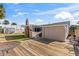 The backyard deck connects to the main house and a side storage area at 505 Wisteria Rd, Daytona Beach, FL 32118