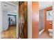 View of the bathroom featuring a barn door and a shower with a stone floor at 505 Wisteria Rd, Daytona Beach, FL 32118