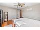 The bedroom offers hardwood floors, closet, neutral walls, and a modern ceiling fan with lights at 505 Wisteria Rd, Daytona Beach, FL 32118