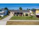 Charming single-story home with a well-maintained front yard and a welcoming covered porch at 505 Wisteria Rd, Daytona Beach, FL 32118