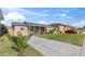 Lovely single-story home with a well-maintained lawn and a convenient driveway at 505 Wisteria Rd, Daytona Beach, FL 32118
