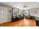 Cozy living room with hardwood floors, neutral paint, and ample natural light at 505 Wisteria Rd, Daytona Beach, FL 32118