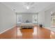 Inviting bedroom features wood floors, natural lighting and an en suite bathroom at 519 Donaldson Dr, Debary, FL 32713