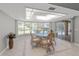 Bright dining area with bay windows overlooking pool at 519 Donaldson Dr, Debary, FL 32713
