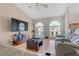 Bright living room with two large arched windows and vaulted ceilings at 519 Donaldson Dr, Debary, FL 32713
