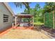 Backyard oasis with a gazebo and hot tub, perfect for relaxation and entertaining at 552 Hamlet Dr, Port Orange, FL 32127