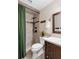 Cozy bathroom featuring a tile shower with a rain shower head and dark bronze fixtures at 552 Hamlet Dr, Port Orange, FL 32127