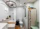 Bright bathroom featuring a soaking tub, modern fixtures, and a decorative parrot statue at 552 Hamlet Dr, Port Orange, FL 32127