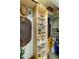Organized closet with built-in shelves and hanging space for clothing storage at 552 Hamlet Dr, Port Orange, FL 32127