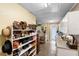 Bonus room featuring shelving, and ample desk space with a separate area for organization at 552 Hamlet Dr, Port Orange, FL 32127