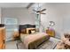 Comfortable bedroom features vaulted ceiling, ceiling fan, and lots of natural light at 64 Ravenwood Ct, Ormond Beach, FL 32174