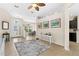 Spacious foyer with tile flooring and an open layout leading to dining room and kitchen at 727 Grape Ivy Ln, New Smyrna Beach, FL 32168