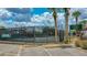 A view of the community tennis & pickleball courts within Sugar Mill Country Club at 727 Grape Ivy Ln, New Smyrna Beach, FL 32168