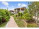 Exterior view of home with a covered patio and beautifully landscaped backyard at 762 Onyx Pkwy, Deland, FL 32724