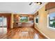 Kitchen area with custom cabinets, countertop, stainless appliances, and hardwood flooring at 762 Onyx Pkwy, Deland, FL 32724