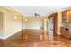 Bright living room featuring hardwood floors, recessed lighting, and sliding glass doors to the outdoor patio at 762 Onyx Pkwy, Deland, FL 32724