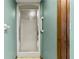 Bathroom shower with frosted glass door and accessibility bar at 8 Rising Moon Trl, Ormond Beach, FL 32174