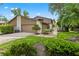 Charming townhome with attached garage, lush landscaping and inviting curb appeal at 8 Rising Moon Trl, Ormond Beach, FL 32174