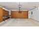 Spacious garage with work bench and pegboard to organize tools at 8 Rising Moon Trl, Ormond Beach, FL 32174