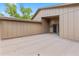 Back patio with neutral-colored siding and sliding glass door entrance at 8 Rising Moon Trl, Ormond Beach, FL 32174