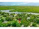 A beautiful aerial view of the property with the intercoastal waterway in the distance at 812 Faulkner St, New Smyrna Beach, FL 32168