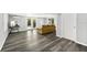 Spacious basement area with modern vinyl flooring, and a walkout to the backyard at 812 Faulkner St, New Smyrna Beach, FL 32168