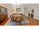 Dining area featuring a wood table and chairs, perfect for Gathering meals and entertaining at 874 Commonwealth Ct, Casselberry, FL 32707