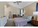 Inviting main bedroom with high ceilings, carpeted floors, and relaxing furnishings at 874 Commonwealth Ct, Casselberry, FL 32707