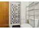 Small bathroom featuring a standard toilet, shower with curtain, and storage shelving at 903 Deer Springs Rd, Port Orange, FL 32129