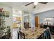 Bright dining room with access to kitchen at 903 Deer Springs Rd, Port Orange, FL 32129